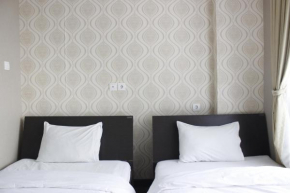 Stylish 1BR near ITB University at Dago Suites Apartment By Travelio